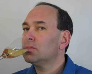 Comedian Shaun Eli drinking Champagne